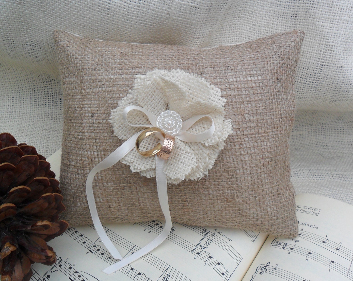 Burlap ring bearer pillow with burlap handmade flower and vintage glass button.