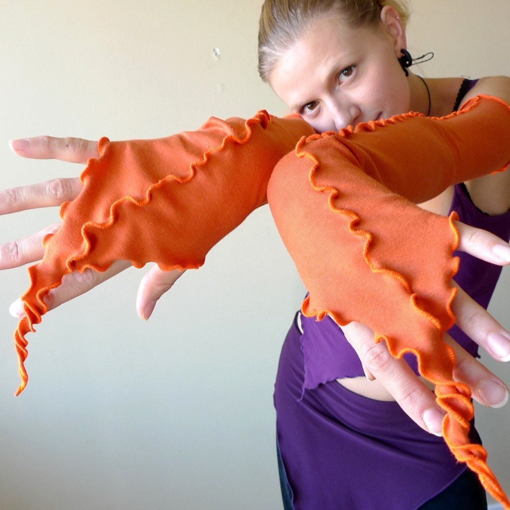 Fluoro Sleeves - spicy orange jersey armwarmers with fluorescent serging, size up to XL.