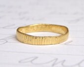 recycled 14 karat yellow gold wedding band ring . woodgrain ethical gold ring . custom 14 karat gold stackable ring by peacesofindigo