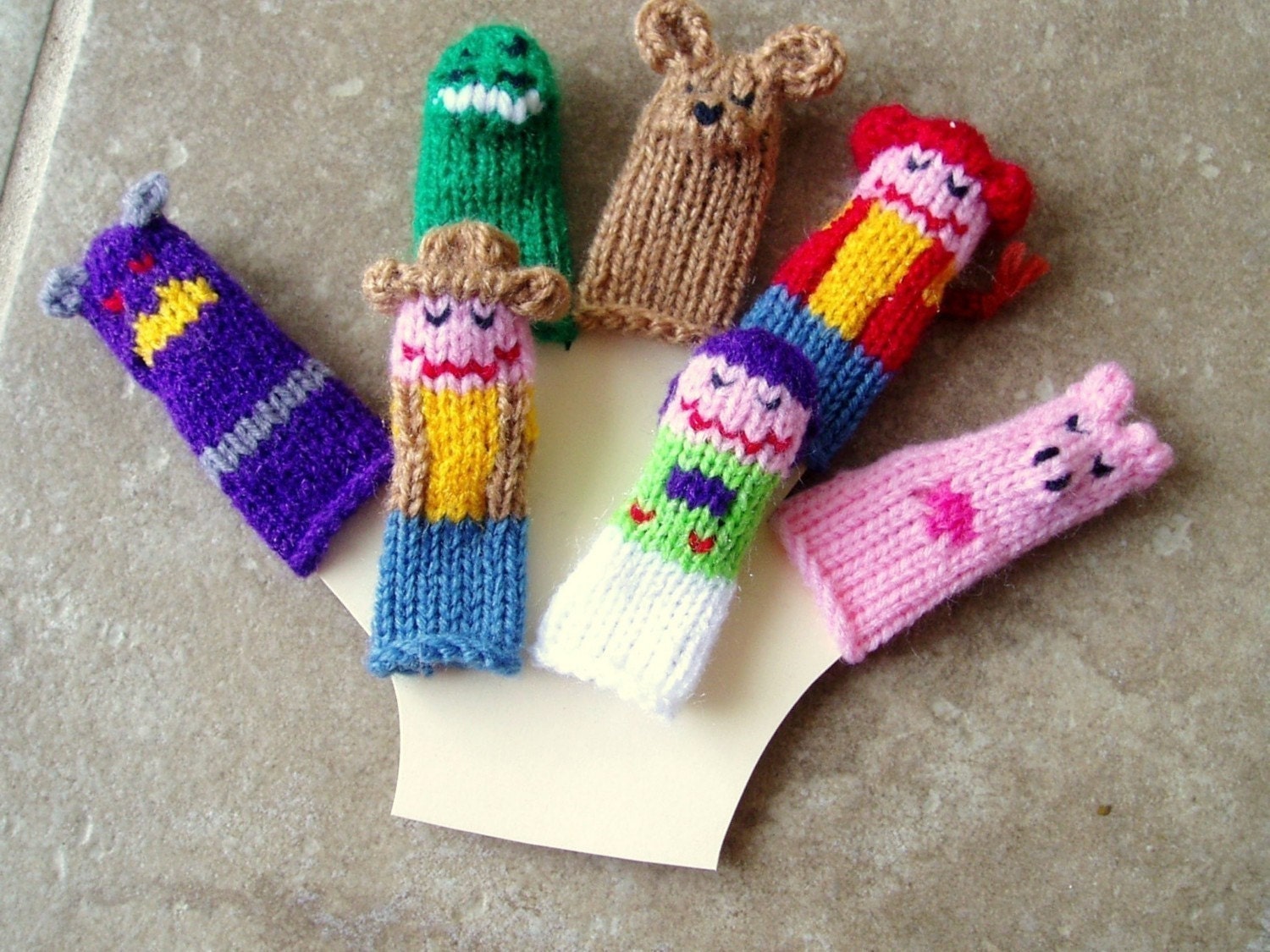 Toy Friends Finger Puppet Set (Includes Cowboy, Spaceman, Evil Spacelord, Dinosaur, Dog, Cowgirl, and Pig.)  We can create custom orders.