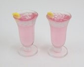 2 Miniature Pink Lemonades in beautiful tea glasses with Lemon slice and Ice in each glass