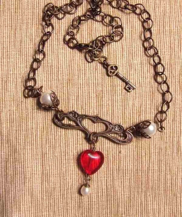 TRULY YOURS Antique Brass Necklace, Vintage Open Heart Pendant, Red Glass Heart Dangle