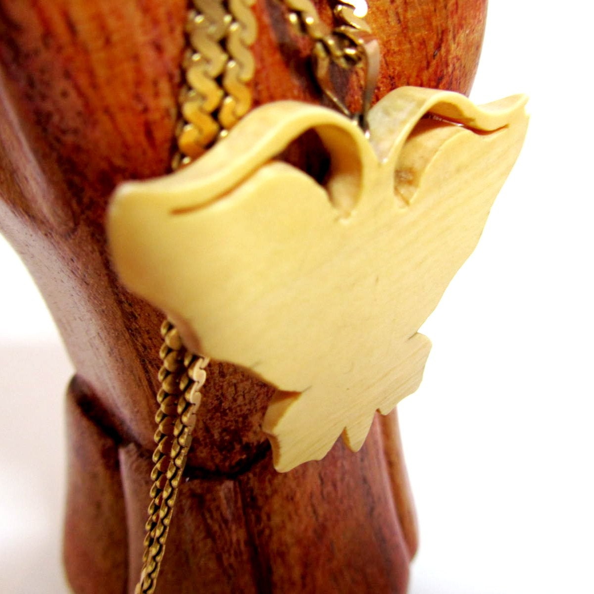 Vintage ivory celluloid butterfly pendant