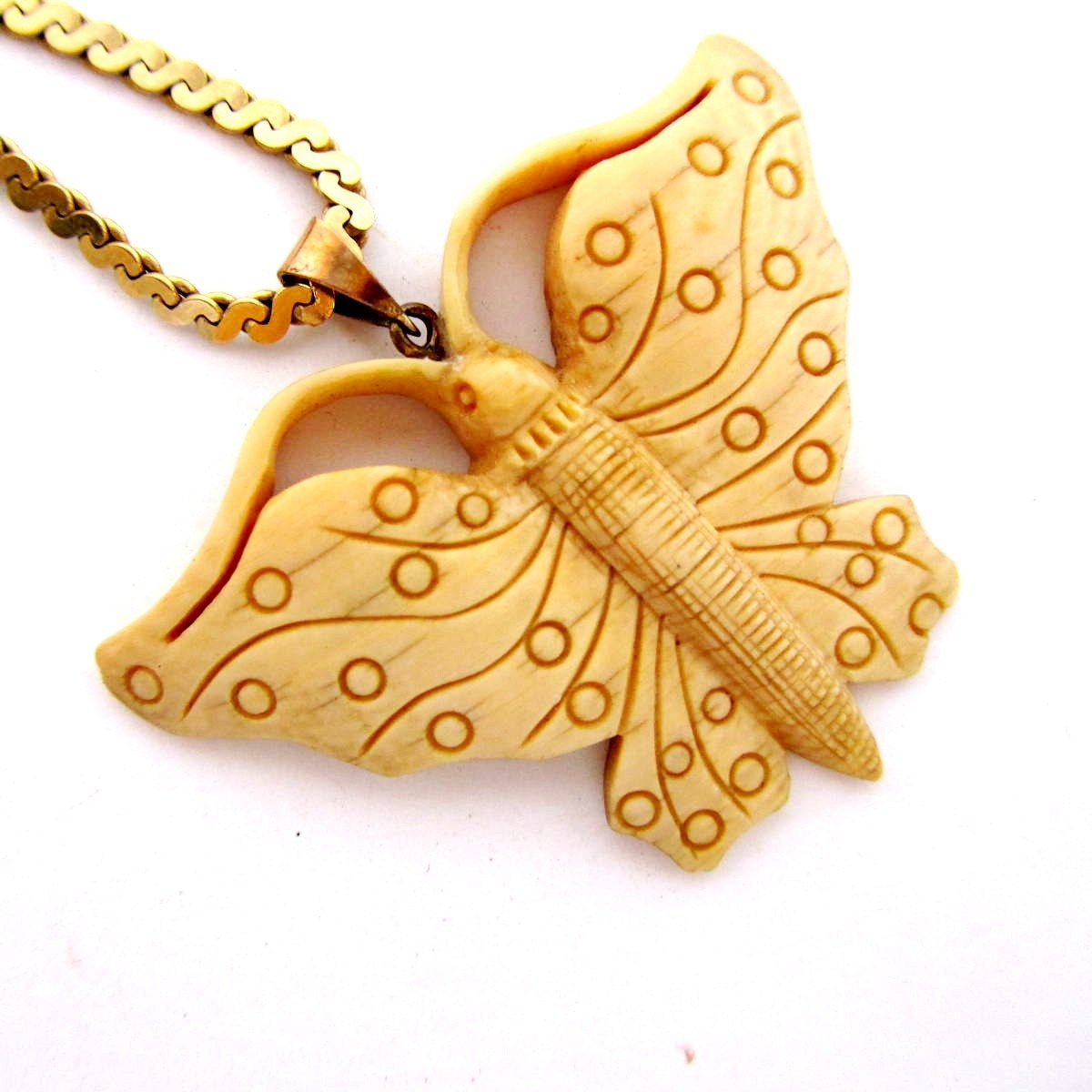 Vintage ivory celluloid butterfly pendant