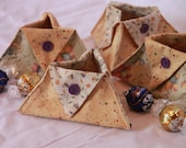 Set of four small neutral fabric triangle baskets