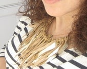 Leather  bohemian fringe necklace in gold leather statement jewlery