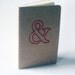 stitched moleskine notebook, red ampersand (lined pages)