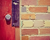 brick architecture detail photograph / red door, brick wall, weathered, cracked / beige, peach, gray, rust / red door / 8x8