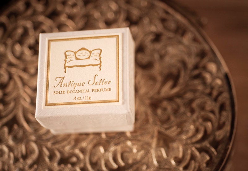 Antique Settee - natural solid perfume in brass compact