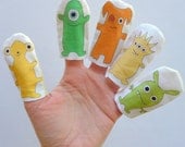 Monster Finger Puppets Printed in Gender-Neutral Yellow, Orange and Green Colors (5-pack)