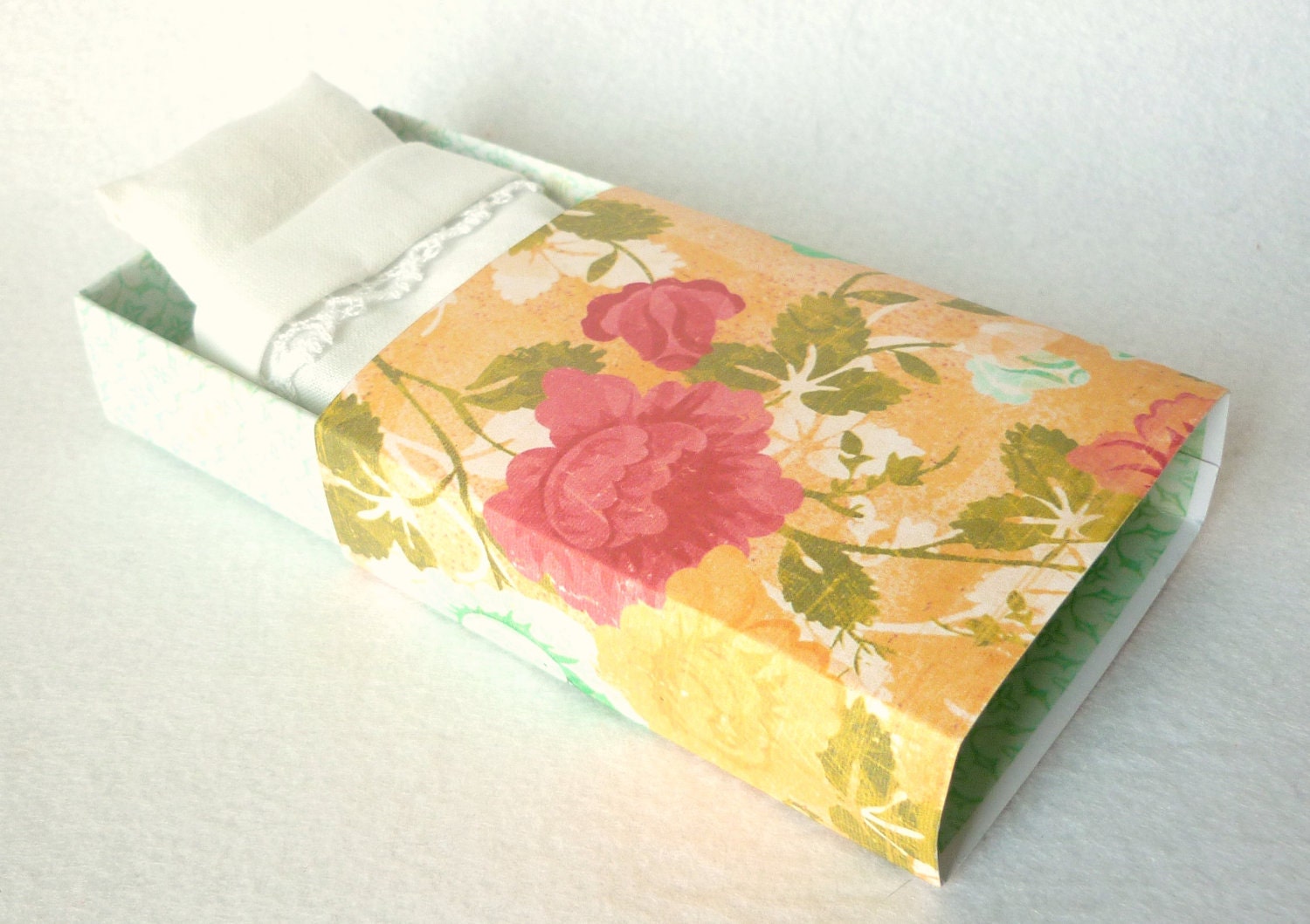 Peach and mint felt mouse miniature plush in matchbox bed