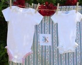 Ruffle Onesie Gift set - one pink check ruffle onesie and one white eyelet ruffle onesie