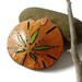 Painted sand dollar pendant copper green black