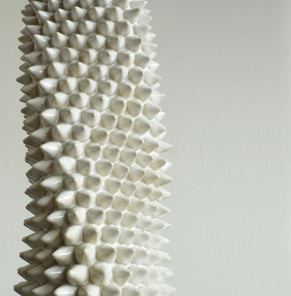 Spiky White Vessel - a functional sculpture with visual movement