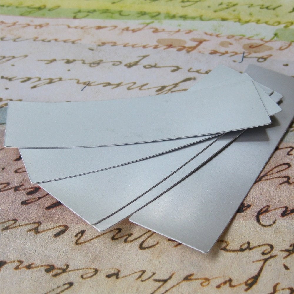 Silver slivers of card