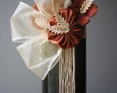liquid gold wine bottle corsage