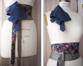 the boyfriend belt in navy, plum and silver