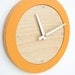 tangerine creamsicle modern wall clock