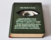 A tiny ship on a journey - book sculpture