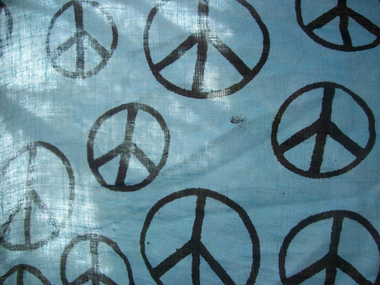 Blue peace-sign print organic cotton voile remnant (some dye defects), 27"x70" approx.