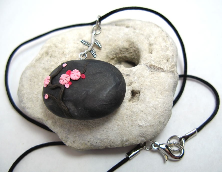 Cherry Blossom Necklace . A hand sculpted ' River Rock ' pendant hanging from black satin, Original Artwork.
