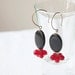 Horn Earrings - Oval black horn beads and faceted cherry red glass beads - statement jewelry - drop earrings - chandelier earrings - dangle