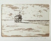 original etching of a beach hut