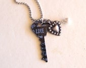 key to love - a necklace of vintage and recycled jewelry