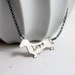 Sterling Silver Dachshund Dog Love Necklace - 5 dollars of every purchase goes to the SPCA