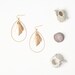 Golden Fan Drop Earrings with Crystal Accent