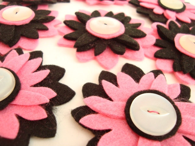 Felt Hot Pink and Black flowers with vintage buttons. x 8