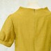 FABRIC BACKORDERED Mustard Yellow Mini Dress with raised neckline