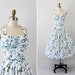 vintage 1950s dress / 50s floral dress / White, Blue, and Green Pinup Halter Dress