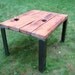 Reclaimed wood dining room table/ Steel base (tag 2)