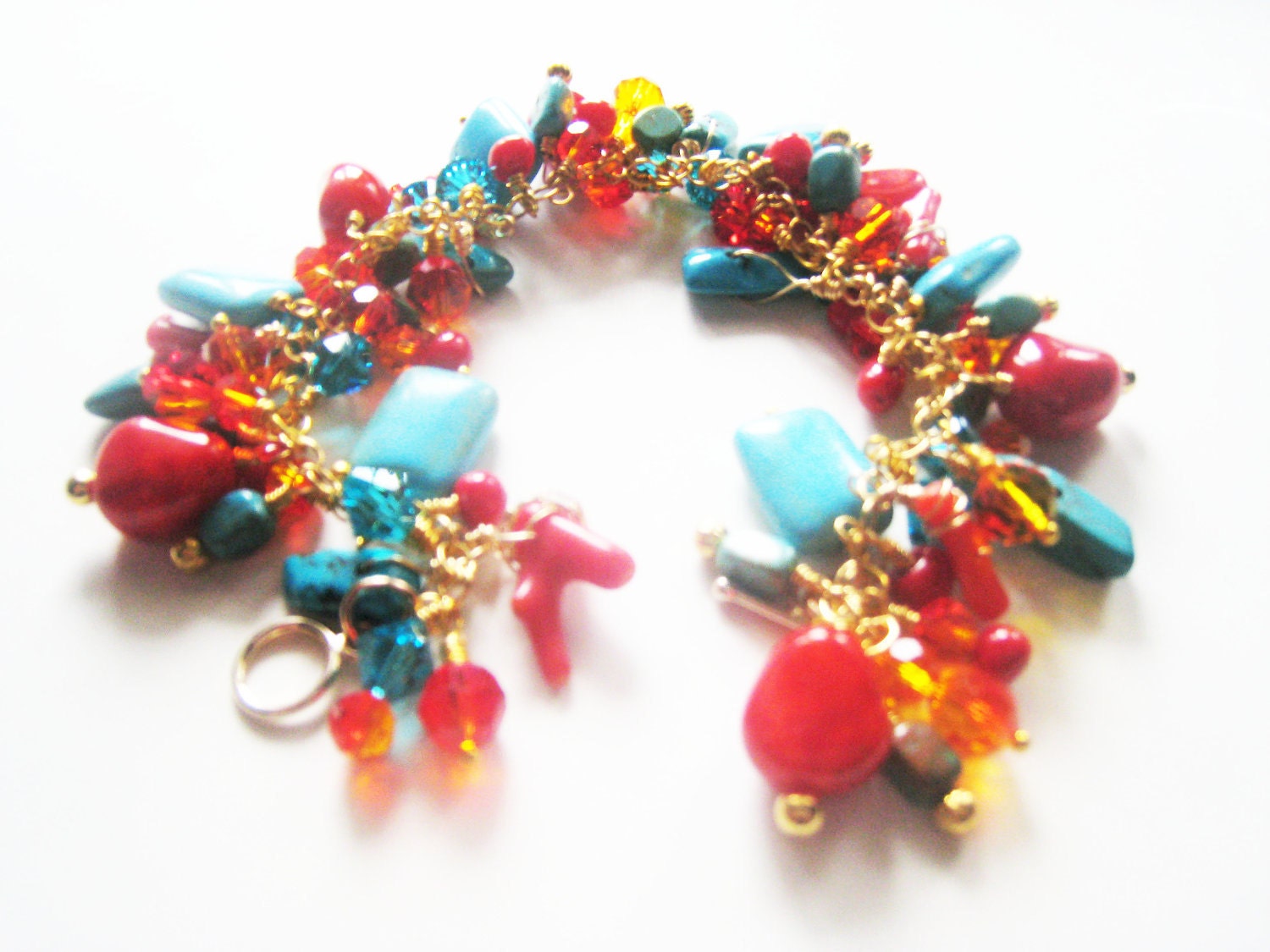 Chunky turquoise bracelet.  Coral gold bracelet.  Gold and crystal charm bracelet.