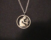 German Lady Planting Flower Cut Coin Necklace from a german 50 Phennig