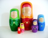 handmade wooden folk art nesting dolls...hijab girls