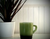 vintage fire king green and black mug