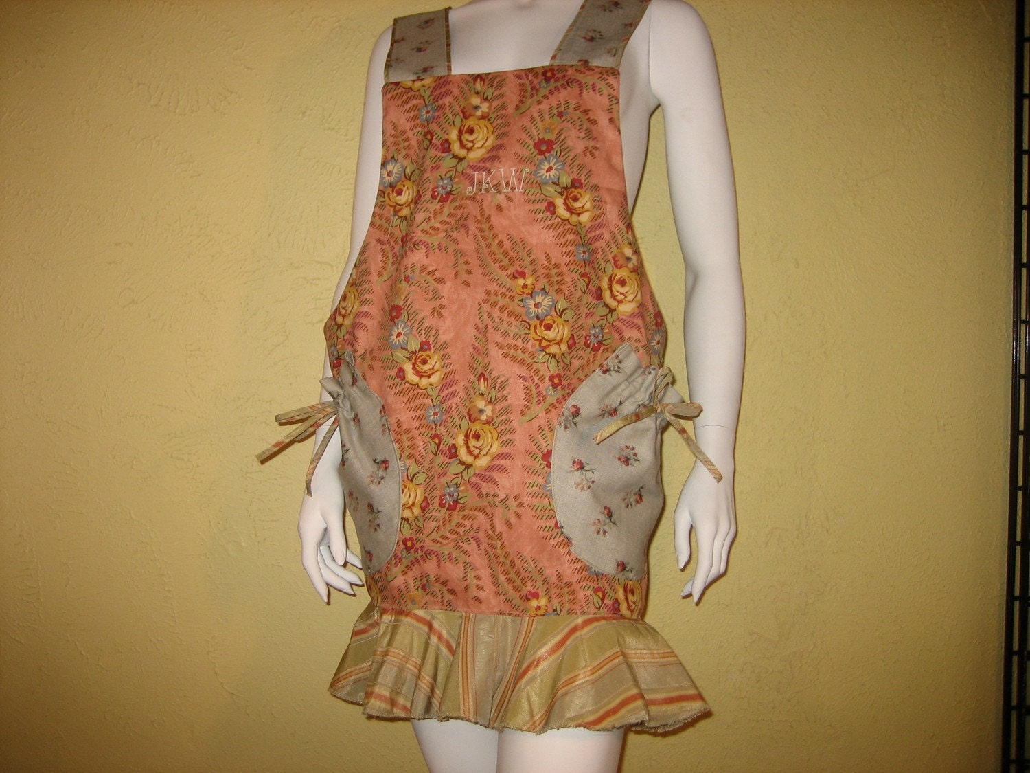 Joyce's feminine full apron, partially lined, Criss Cross Back for support with Roomy Drawstring Pockets, Ruffled Hemline