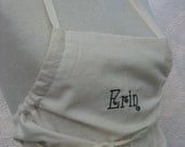 Erin's Personalized full apron, drawstring tie pulls through sides to adjust at neck and back, four roomy pockets, embroidered with name