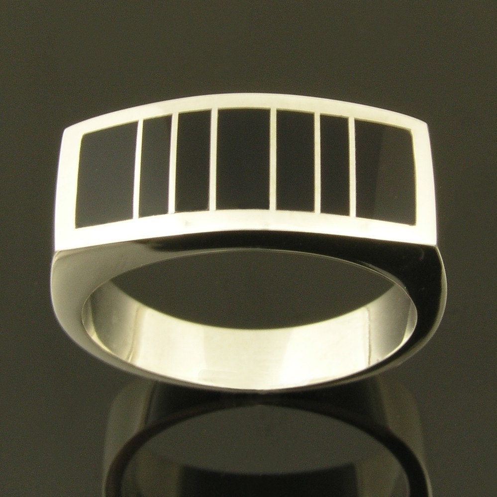 Handmade man's sterling silver ring inlaid with black onyx.