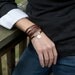 Five Time Red Brown Leather Wrap with Circular Floral Charm