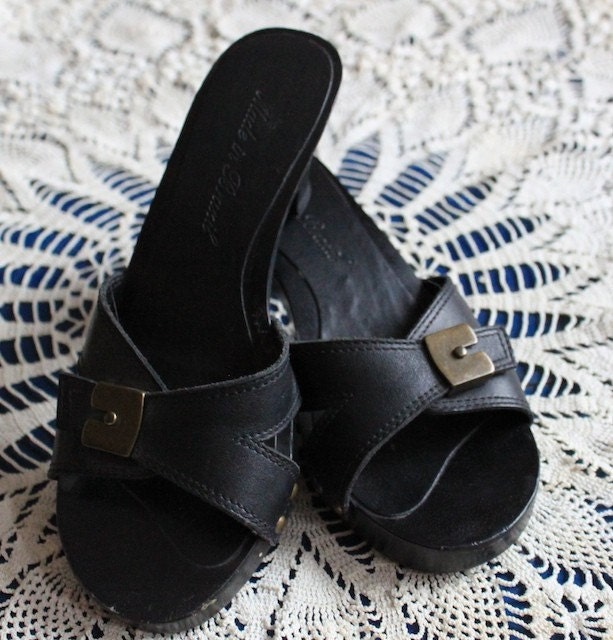 high-heel black studded clogs  7