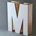 M is for magazine. in white.