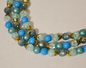 1960s Shades of Light Blue Triple Strand Beaded Necklace Choker