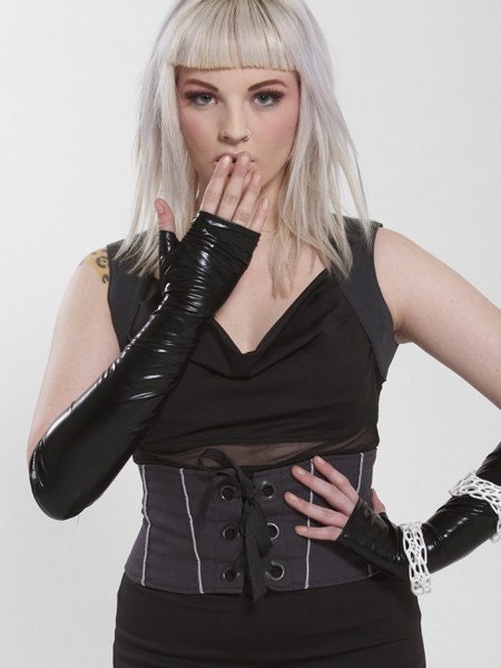 Fingerless black opera gloves, sleeves, arm warmers.