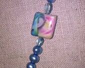 pink and blue ribbon necklace