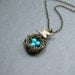Turquoise Bird Nest Necklace with Swallow in Antiqued Brass
