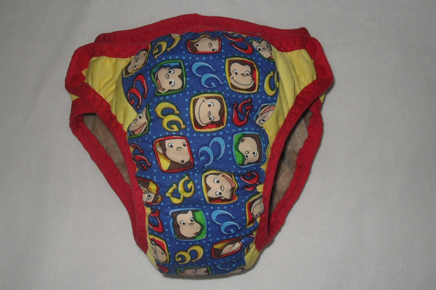 Training pants made from Curious George  fabric