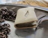 Mini book necklace with old paper